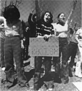 The Princeton Alumni Weekly identifies the woman on the right as Marta Rita Velázquez as a student on 18 March 1977.